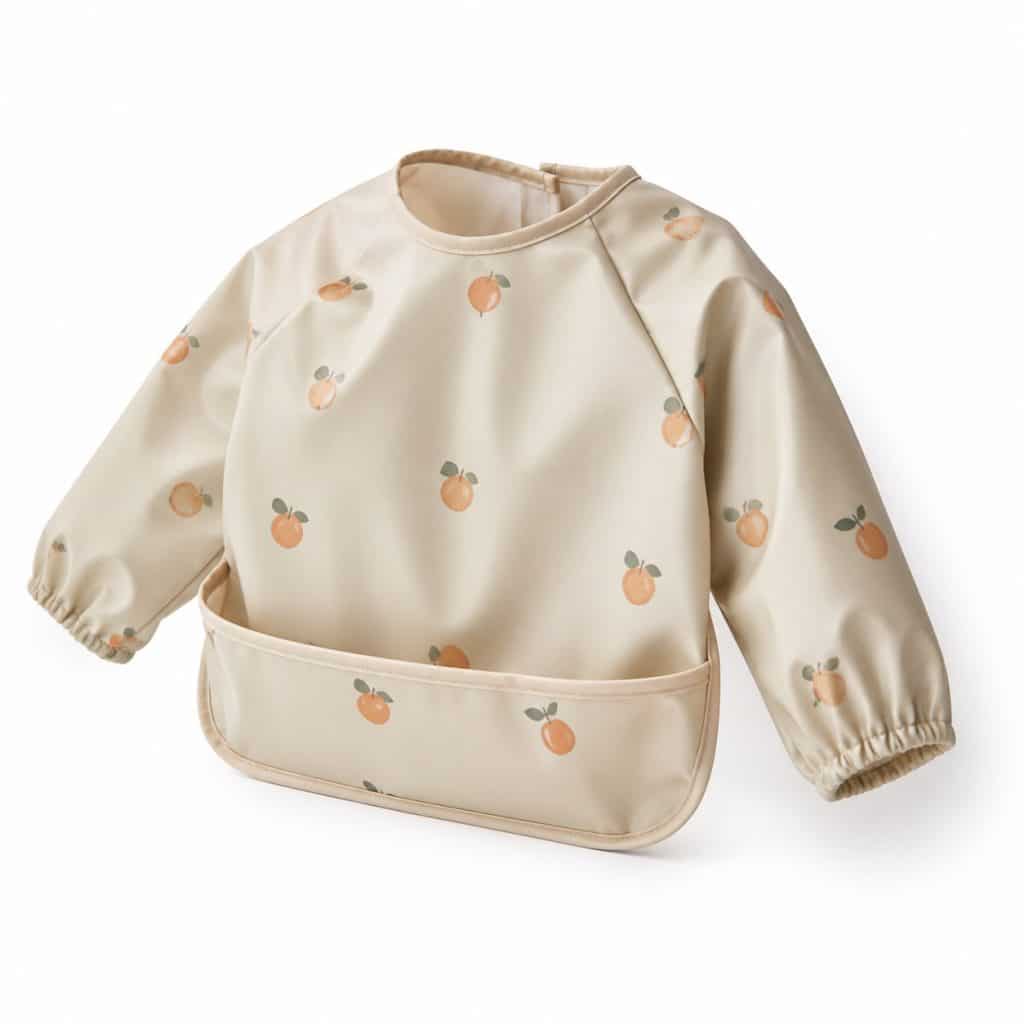 Bavoir à manches imperméable présenté seul