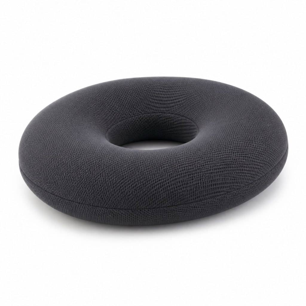 Coussin de positionnement assis en forme d'anneau présenté seul